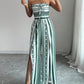 📢📢50% OFF !! ⏰Geometric Jumpsuit with Halter Neckline & Side Slit – Unique print & elastic back – Versatile, perfect for summer parties or resort wear ✨