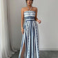 📢📢50% OFF !! ⏰Geometric Jumpsuit with Halter Neckline & Side Slit – Unique print & elastic back – Versatile, perfect for summer parties or resort wear ✨